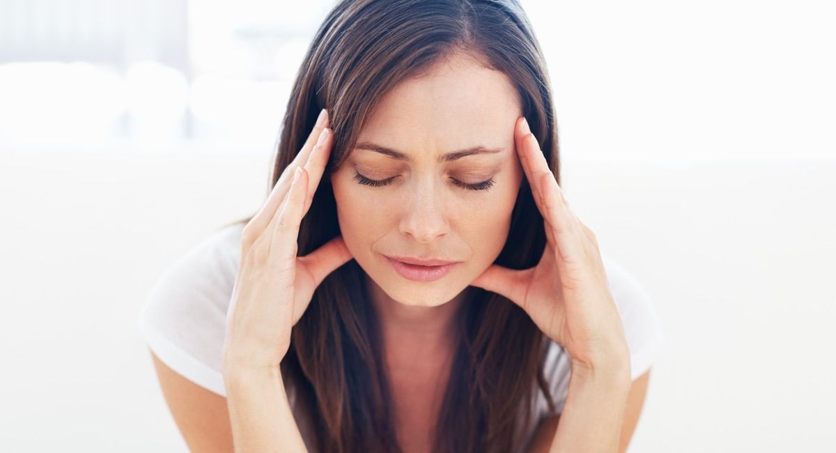 Woman suffering from headache
