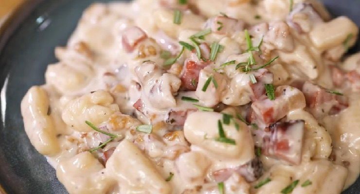 Preparare Gnocchi di zucca speck e taleggio