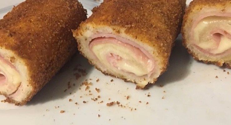 Involtini di toast con prosciutto e fontina