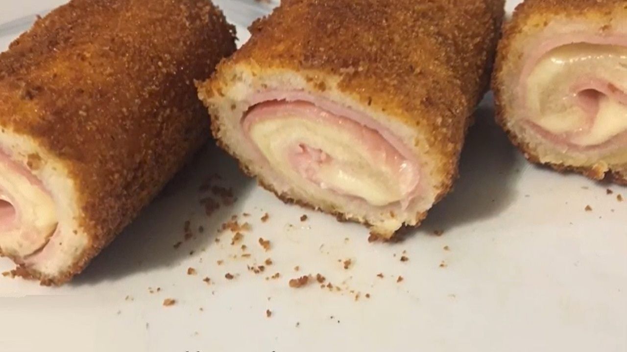 Involtini di toast con prosciutto e fontina