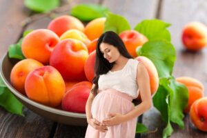 albicocche e donna incinta