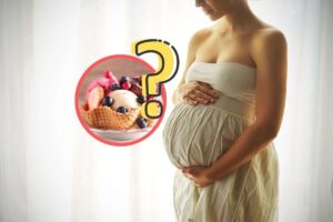 donna incinta, gelato e punto interrogativo