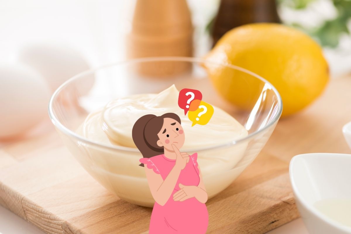sullo sfondo ciotolina con maionese, tagliere di legno, saliera, pepiera e limone, in primo piano grafica di una donna in incinta e punti interrogativi