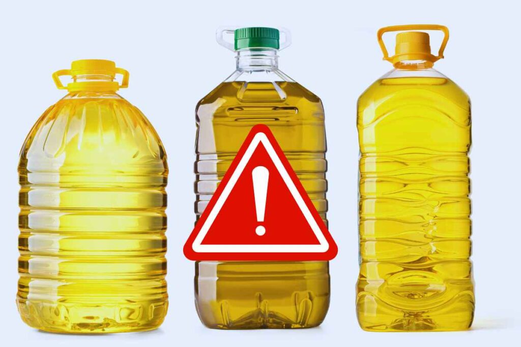 bottiglie di olio segnale di pericolo