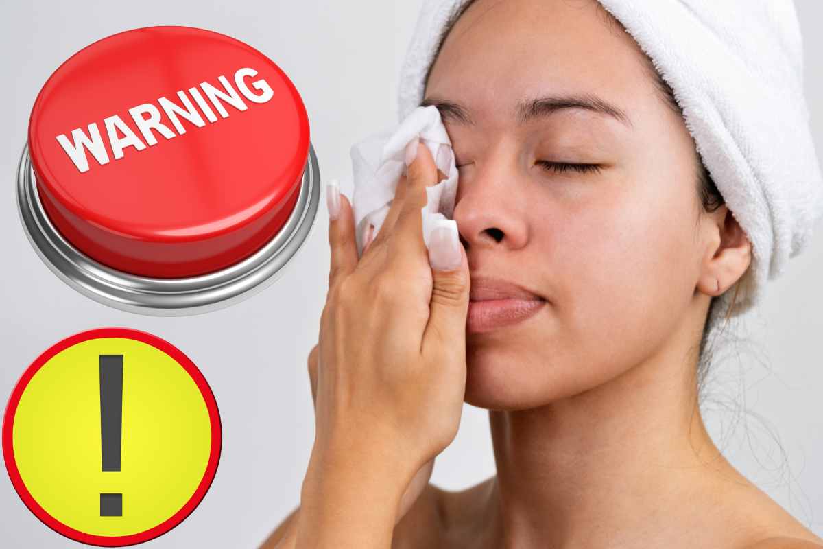 Donna usa salviette struccanti e segnali di pericolo