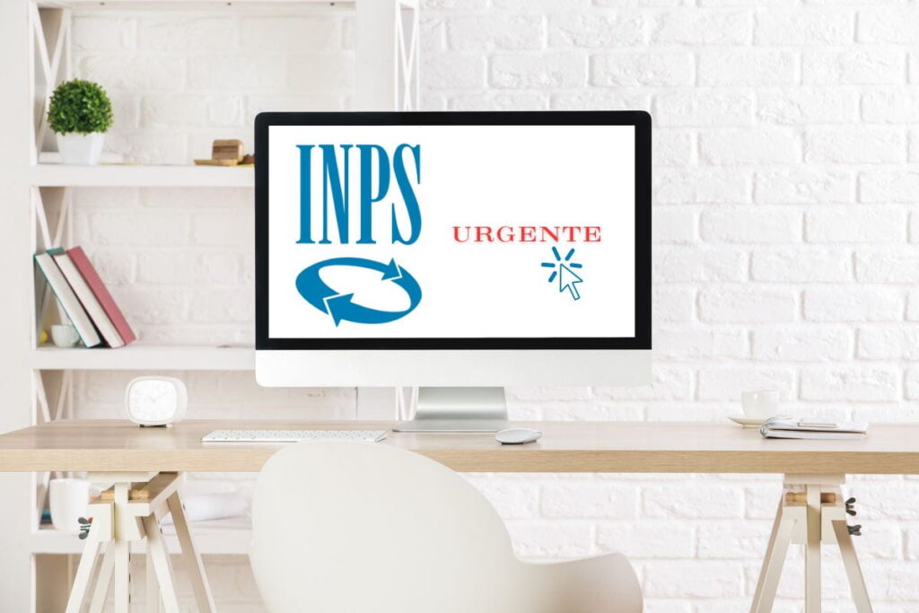 schermo pc su scrivania con logo inps e scritta urgente e cursore pc