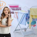 donna indica in alto grafica wow e stendino con bucato steso